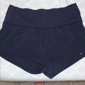 LULULEMON NAVY BLUE SHORTS w/ Mesh design SZ 4